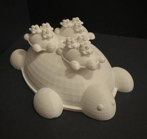 Image of 3-D printed Turtles on top of turtles (recursively)